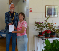 Vera Wilson receiving the Russel Green Cup